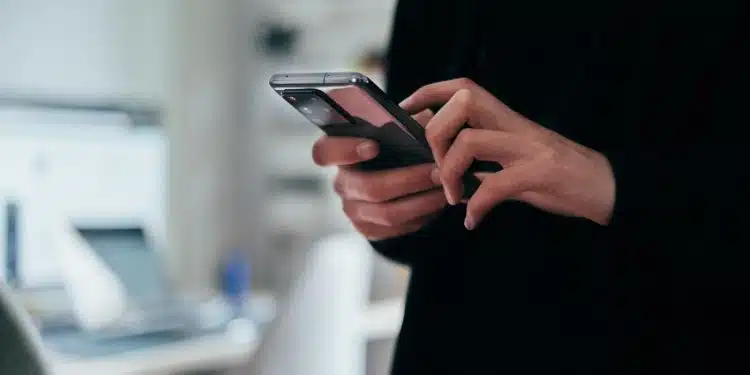 person holding black android smartphone